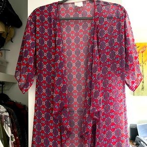 Lularoe Madison topper. Beautiful colors. Pretty fringe size small